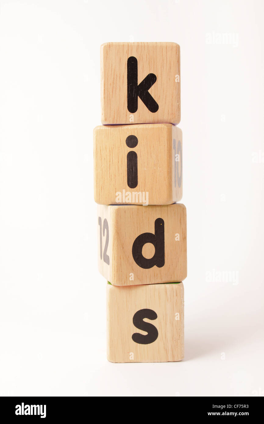Stacked wooden blocks spelling the word kids Stock Photo