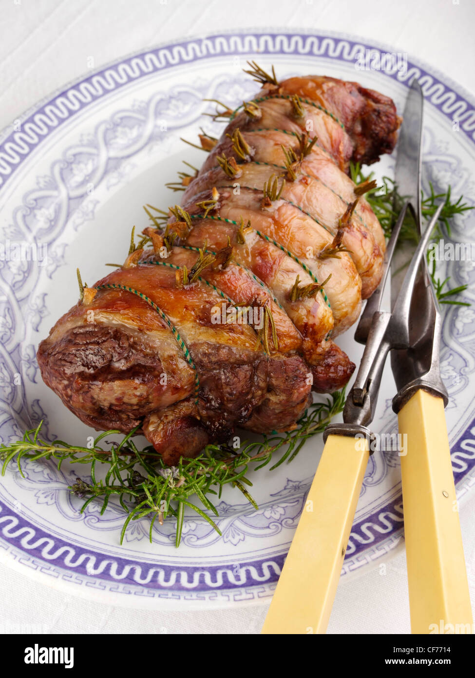 Whole roasted boned rolled leg of lamb Stock Photo - Alamy