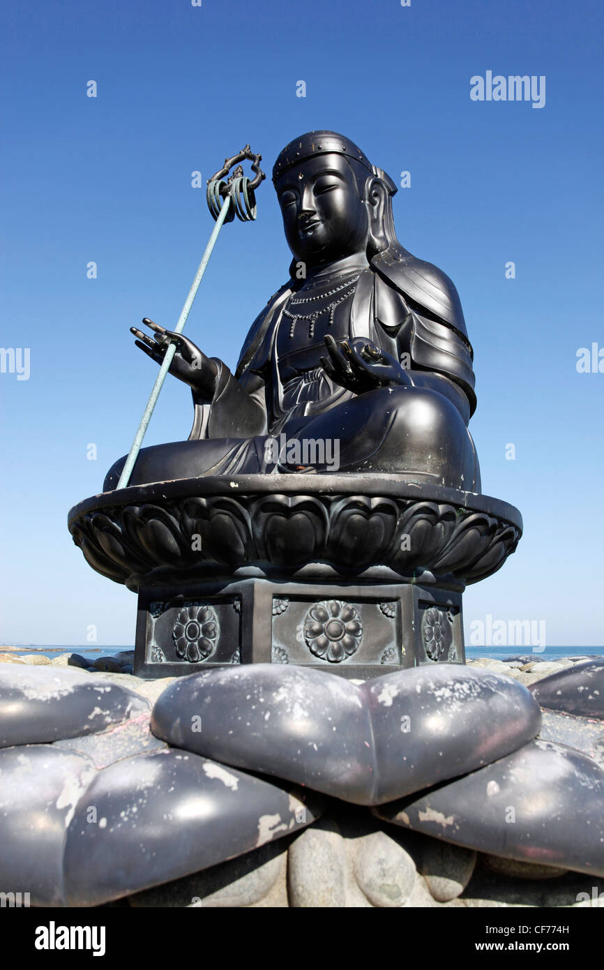 Haesu Gwaneum Daebul seawater goddess statue at Haedong Yonggungsa Buddhist temple in Busan, South Korea Stock Photo