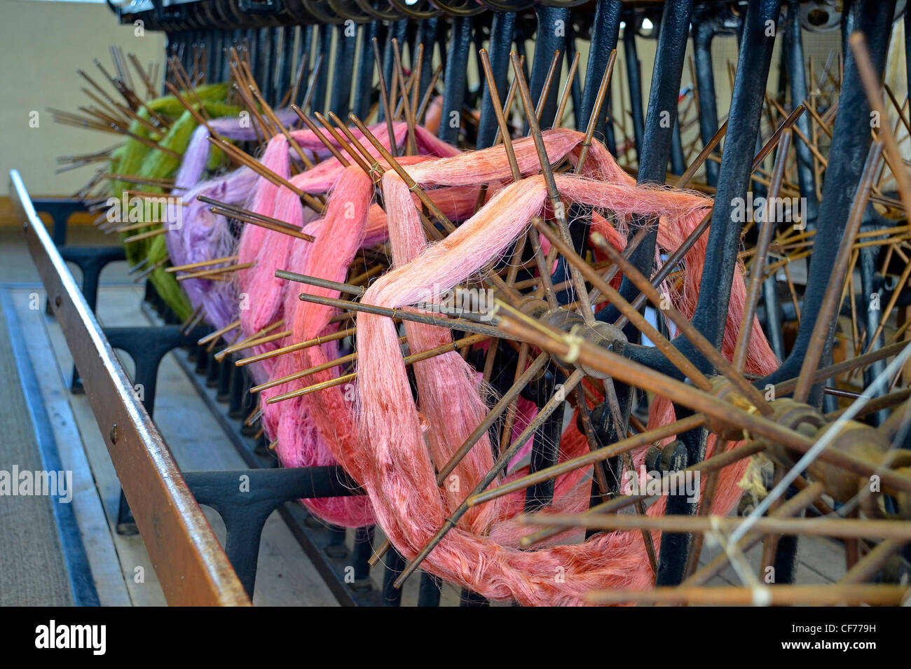 Silk thread on loom at Whitchurch silk mill Stock Photo