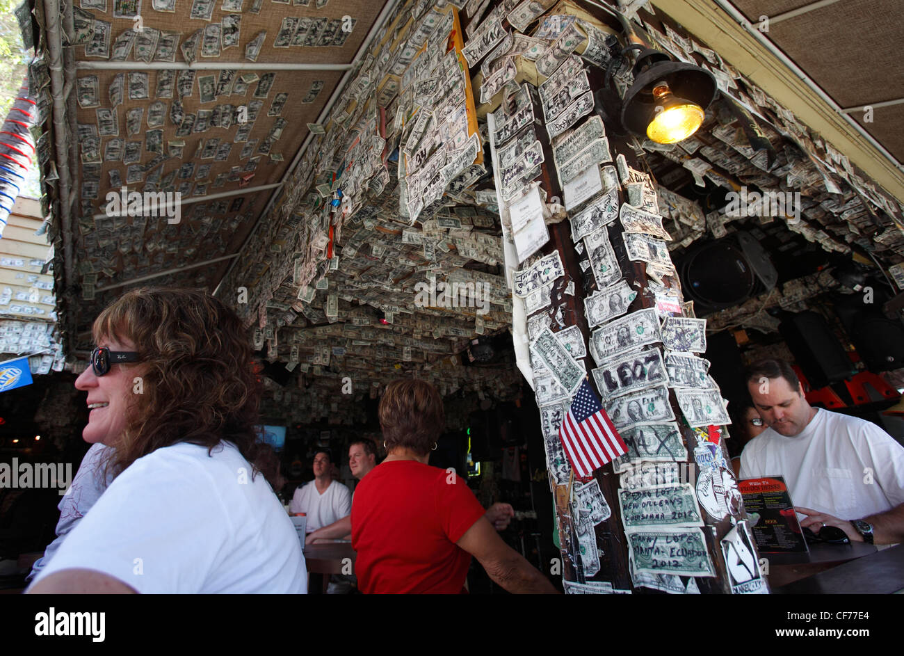 dollar bills stapled to the walls and ceiling by patron's of Willie T's bar, Key West, Florida Stock Photo