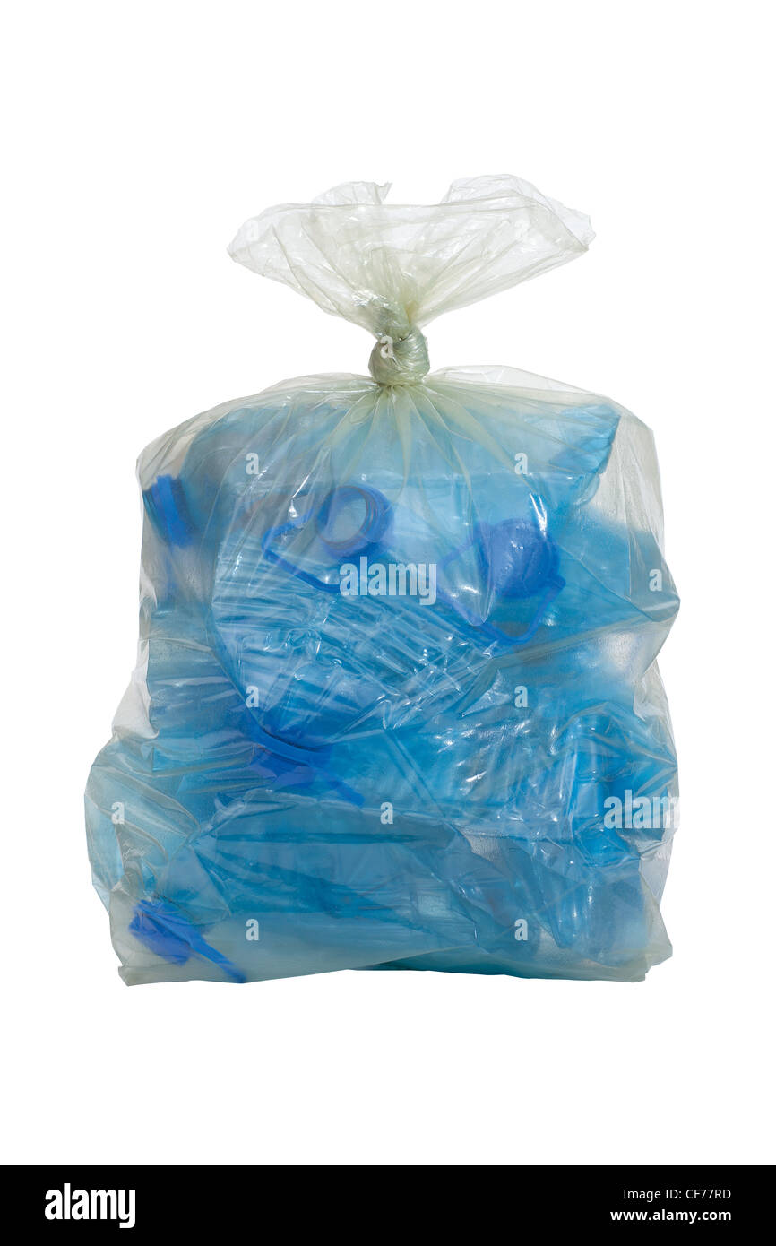 plastic bag with crushed blue plastic bottles isolated on white background Stock Photo