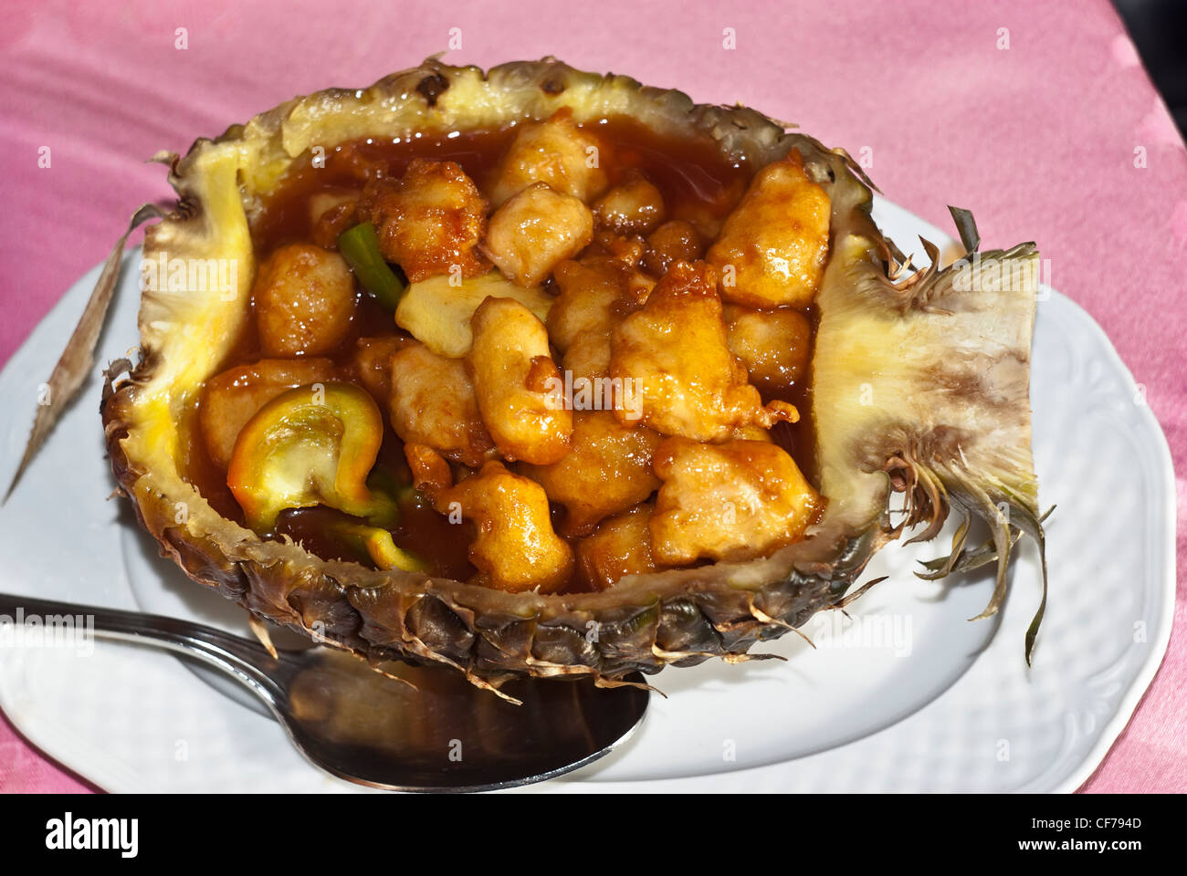Chinese chicken sweet and sour sauce inside pineapple Stock Photo Alamy