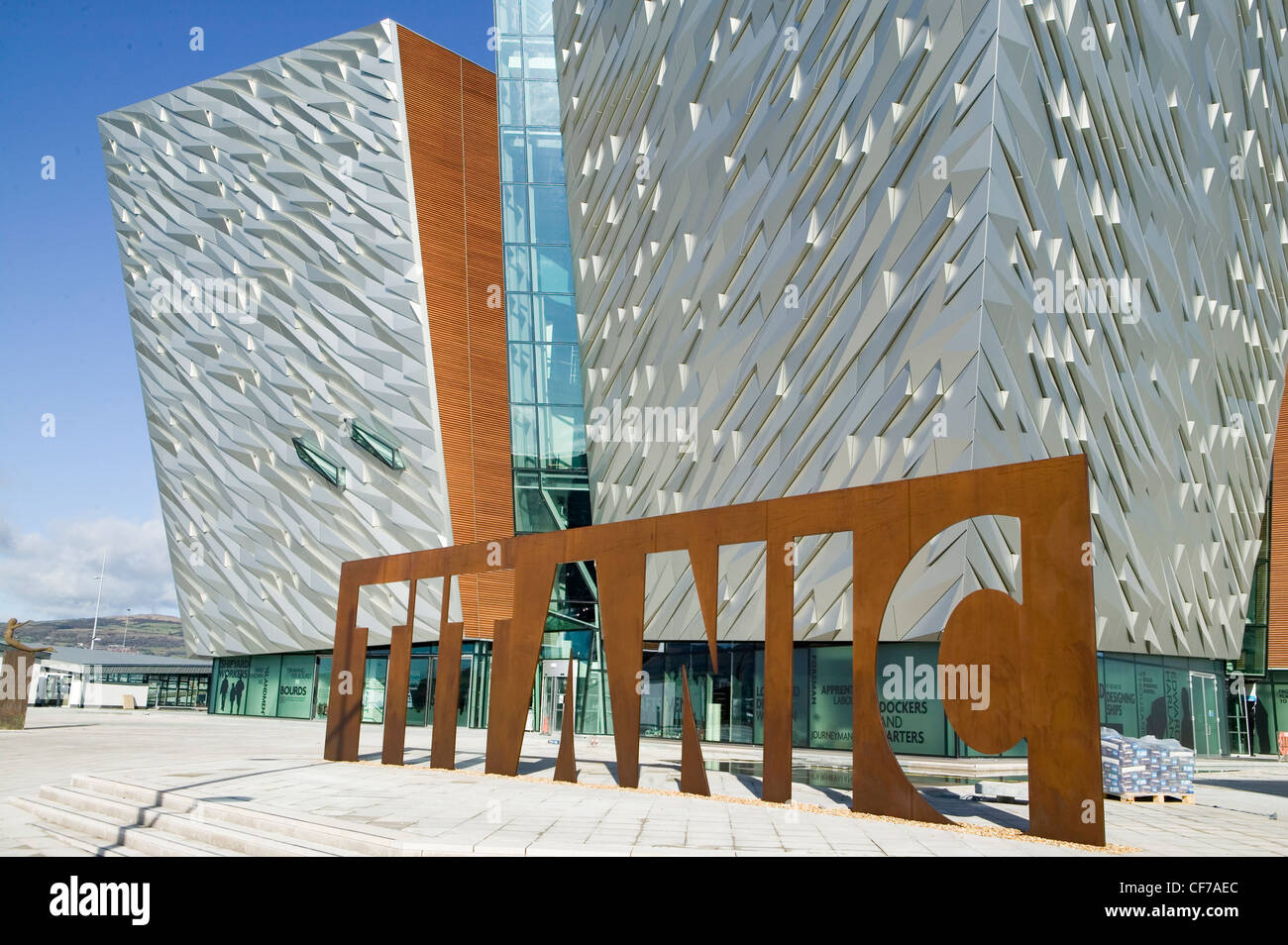 New Titanic Belfast® visitor centre frontage. The word TITANIC is cut from sheet steel at Harland and Wolff, Titanic's builders. Stock Photo