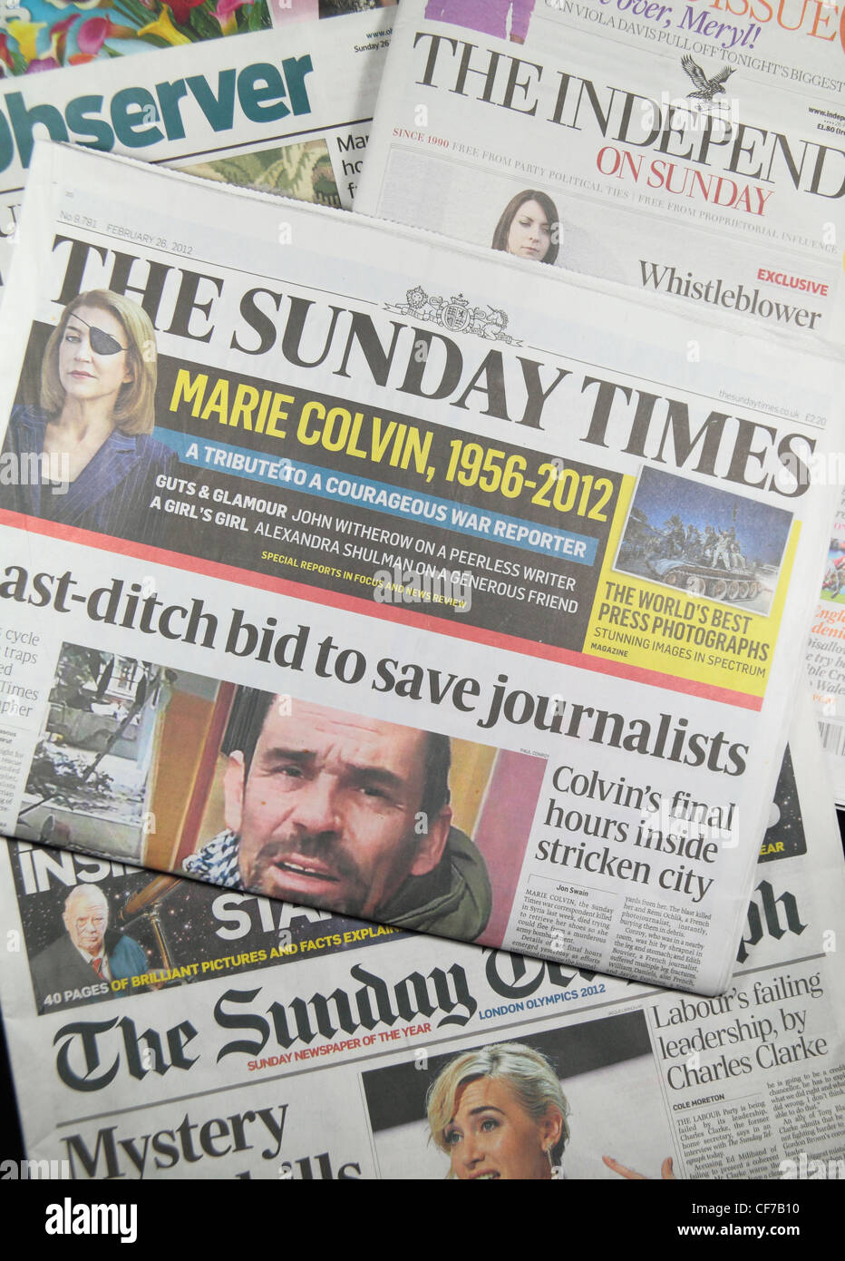 The Sunday Times sitting on the other quality UK national newspapers (The Observer, The Sunday Telegraph, The Independent). Stock Photo