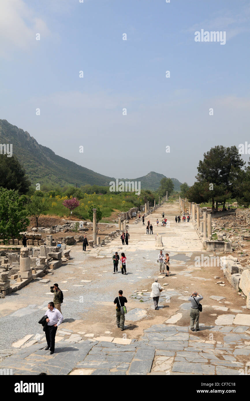 Tourists people walking on the Arcadian Way, street to the harbour Ephesus Turkey Stock Photo