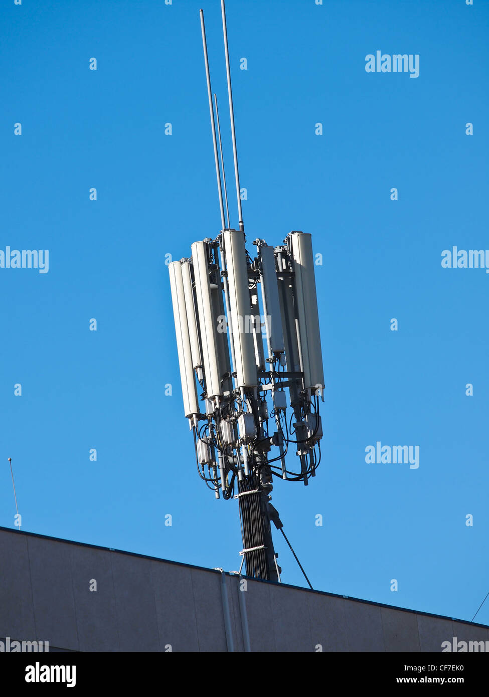 big antenna on the roof of building Stock Photo