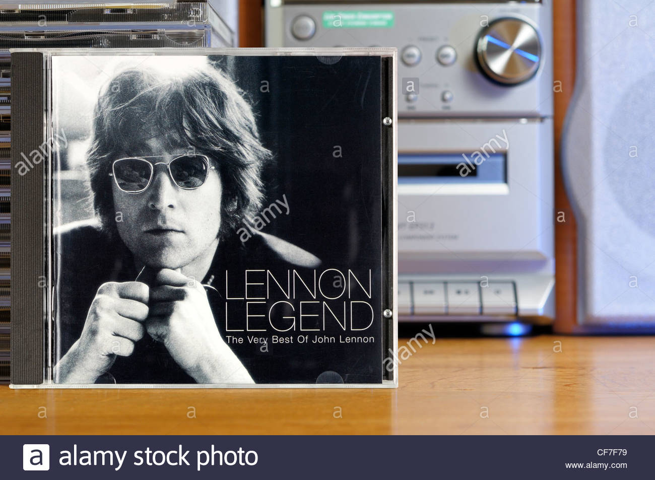 John Lennon Legend album case in front of a CD player, England Stock Photo  - Alamy