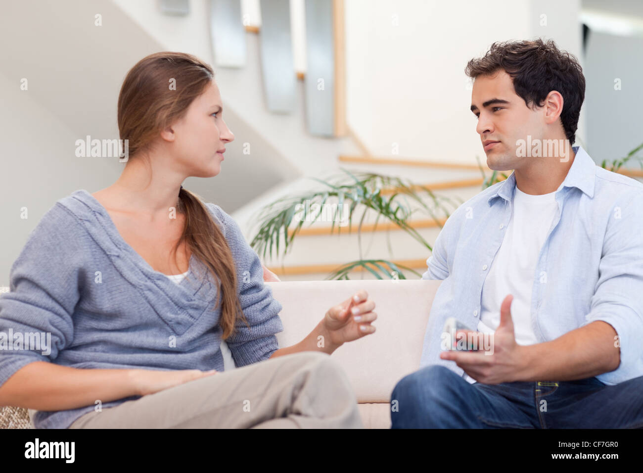 Couple having an argument Stock Photo - Alamy