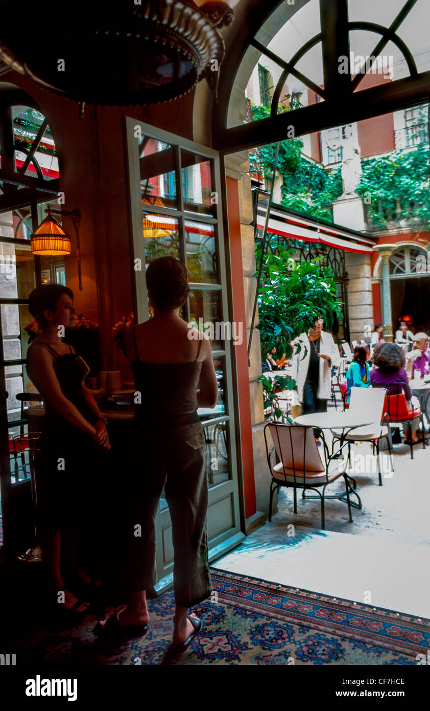 Paris, France - Inside Looking out door, to Garden Patio, at 'Hotel Costes', interior Restaurant, Terrace. Stock Photo