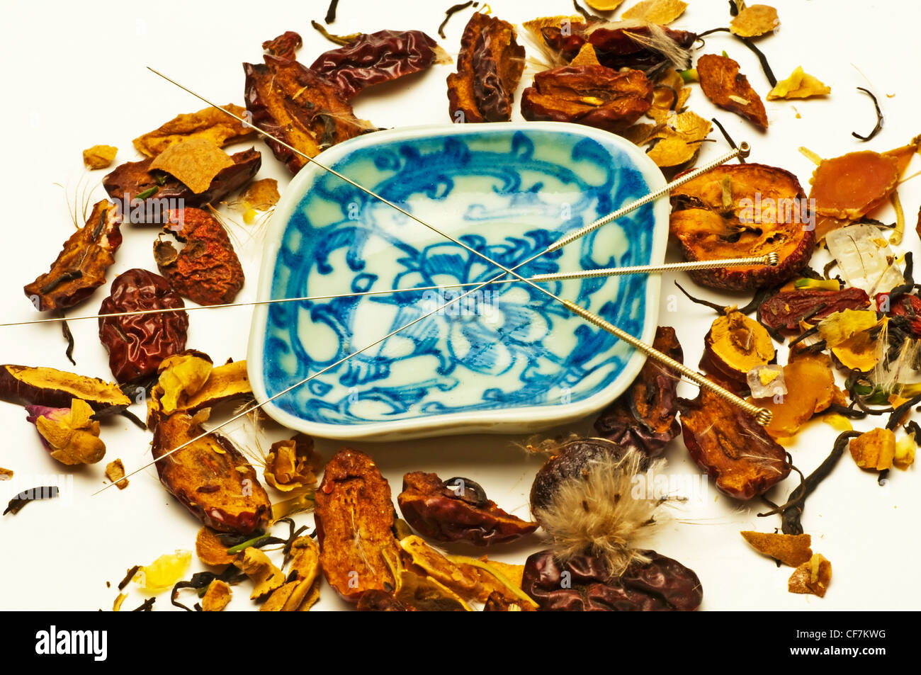 Acupuncture needle and Chinese herbs Stock Photo Alamy