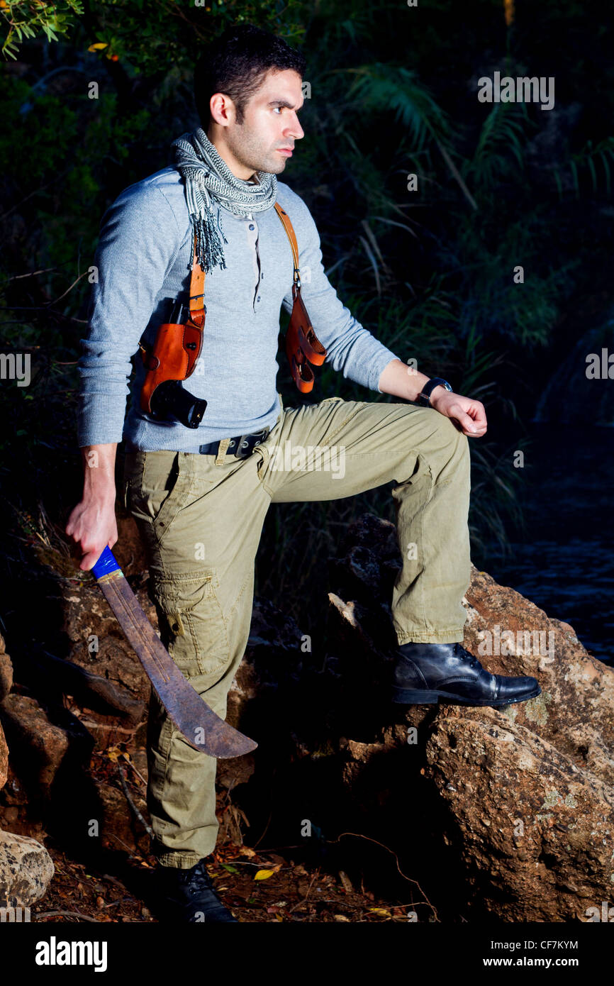 Holding machete jungle hi-res stock photography and images - Alamy
