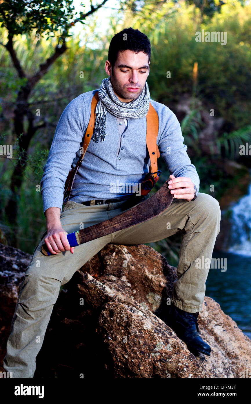 Holding machete jungle hi-res stock photography and images - Alamy