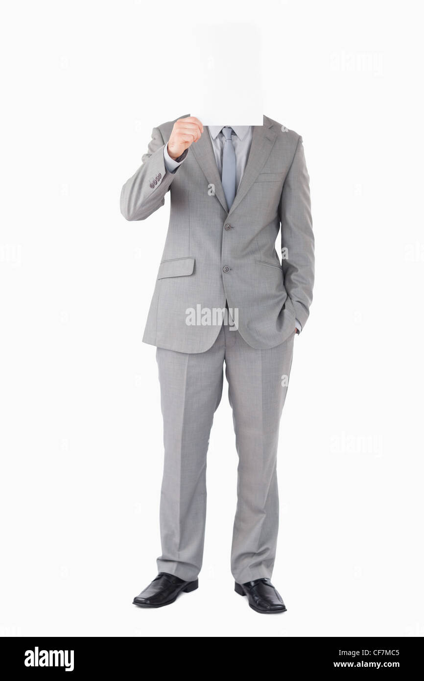 Portrait of a businessman holding a blank panel in front of his face Stock Photo