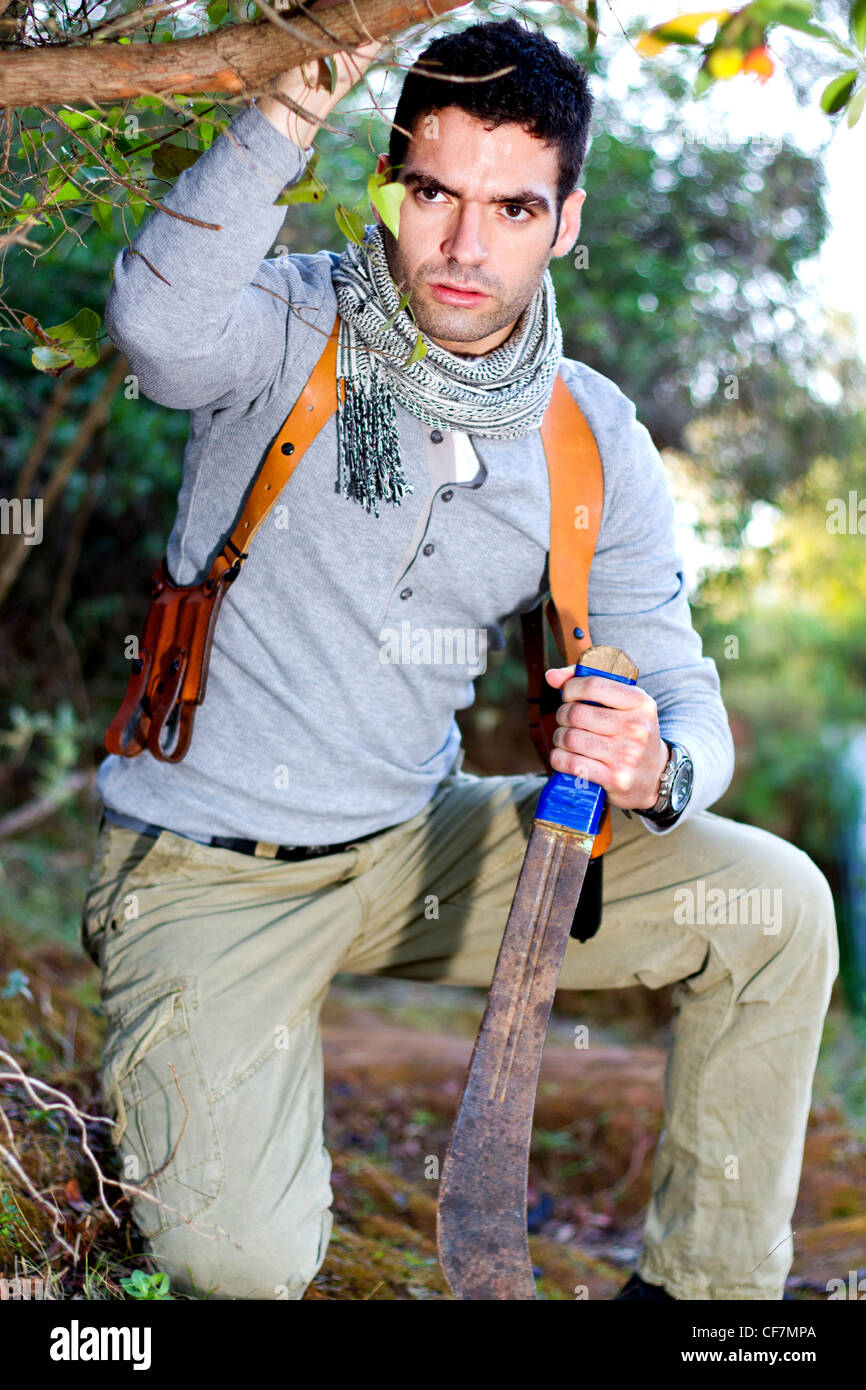 Holding machete jungle hi-res stock photography and images - Alamy