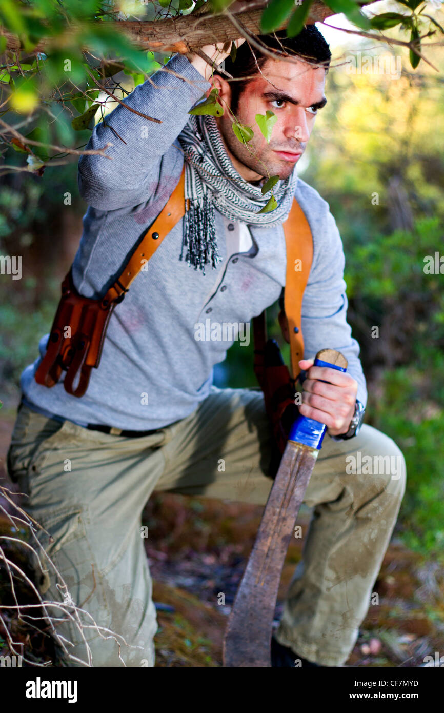 Holding machete jungle hi-res stock photography and images - Alamy
