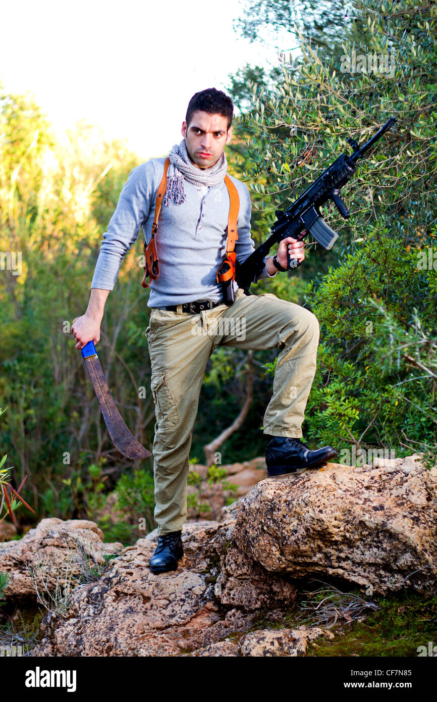 Holding machete jungle hi-res stock photography and images - Alamy