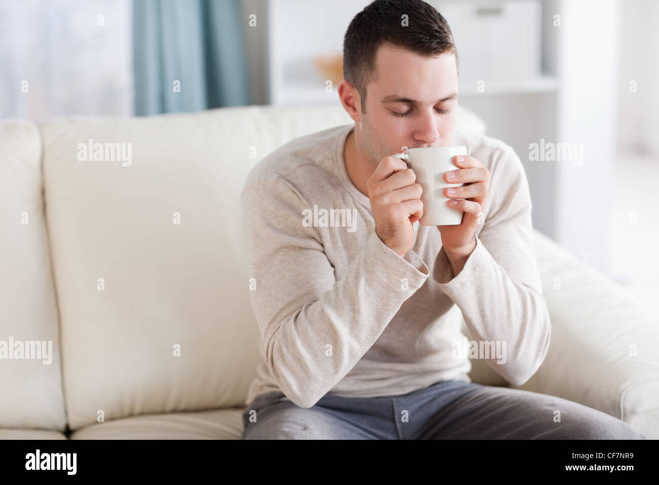 Good looking man having a tea Stock Photo