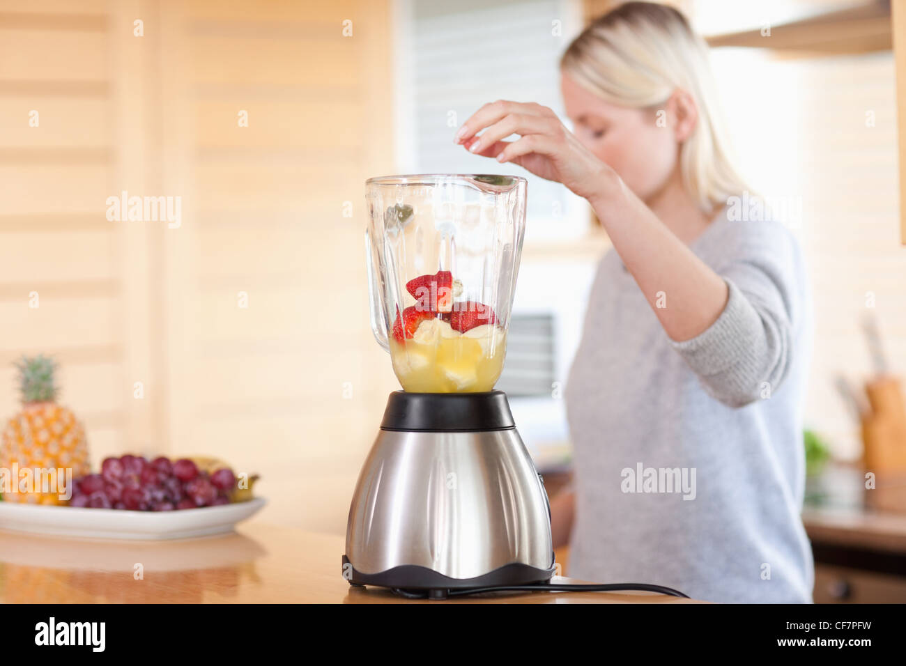 Side view of blender getting filled Stock Photo Alamy