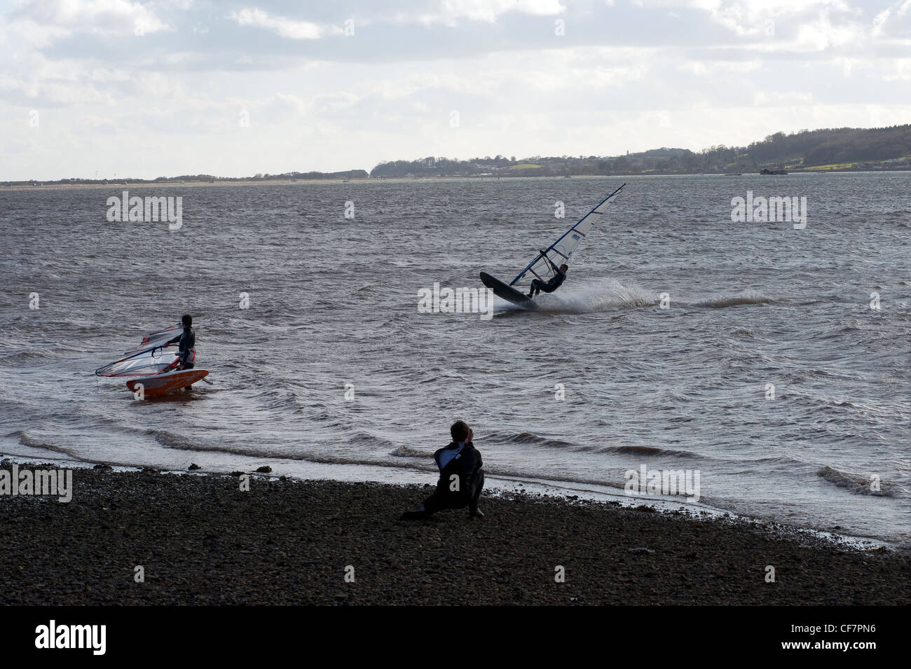 windsurfing on river exe, active, activity, adrenalin, adult, anonymous, blue, board, boardsailing, carving, fast, fun, gibe, Stock Photo