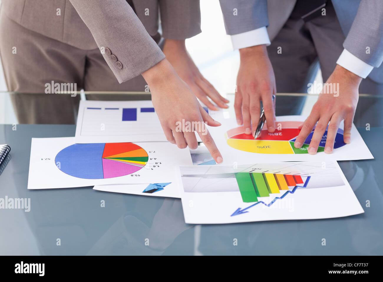 Hands of business people studying statistics Stock Photo