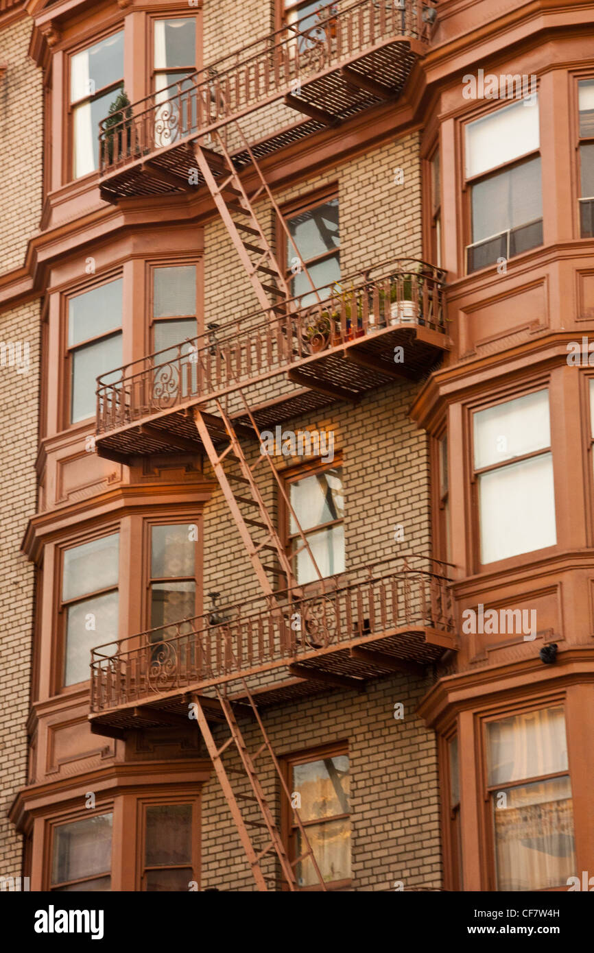 apartment building in san francisco with fire escapes on front of buildings Stock Photo