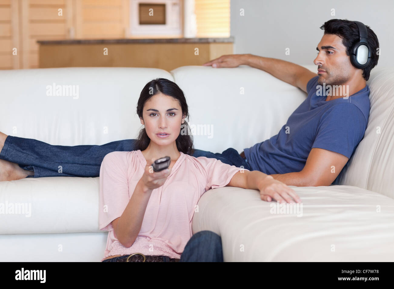 Image result for picture of listening while watching tv