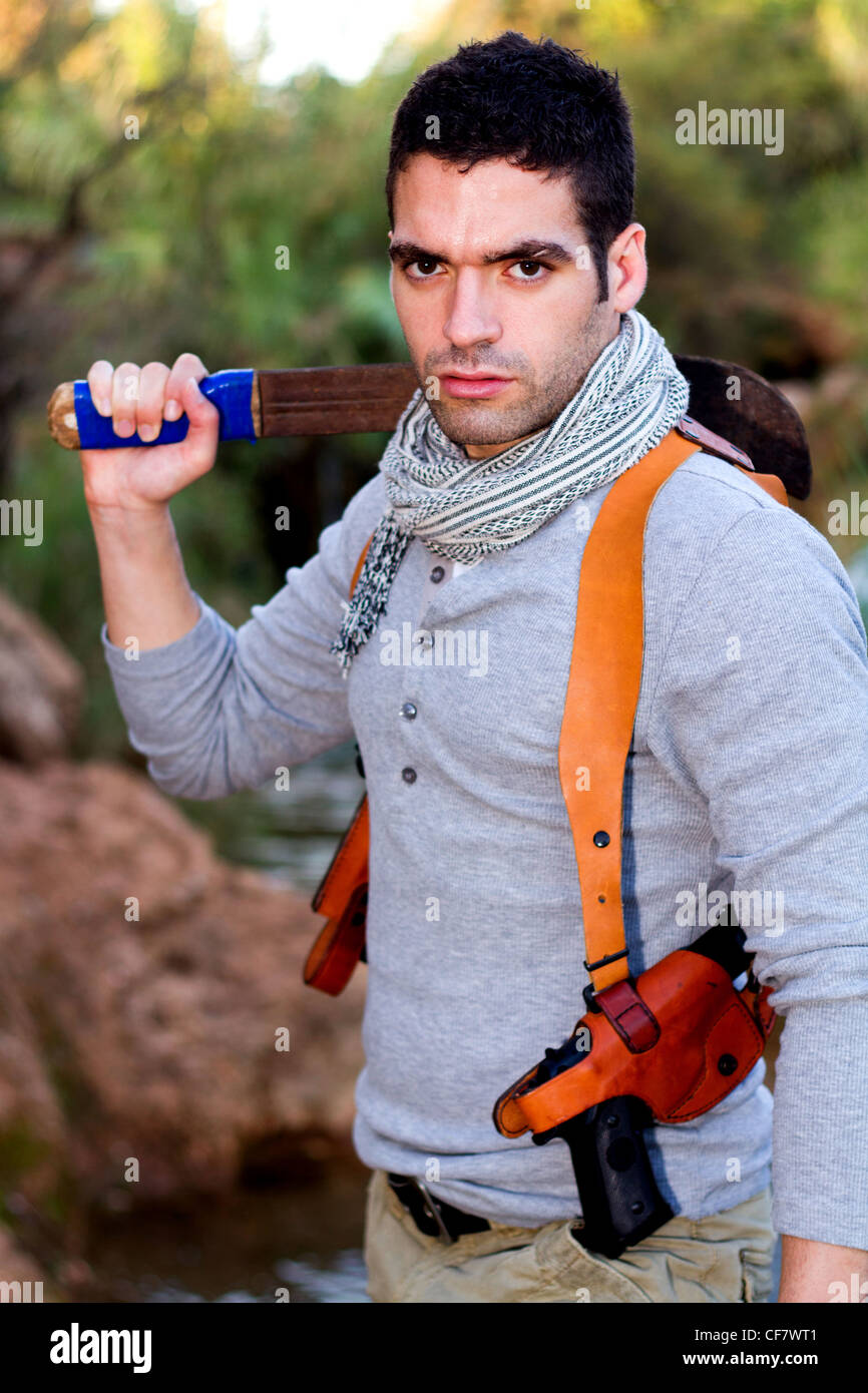 Holding machete jungle hi-res stock photography and images - Alamy