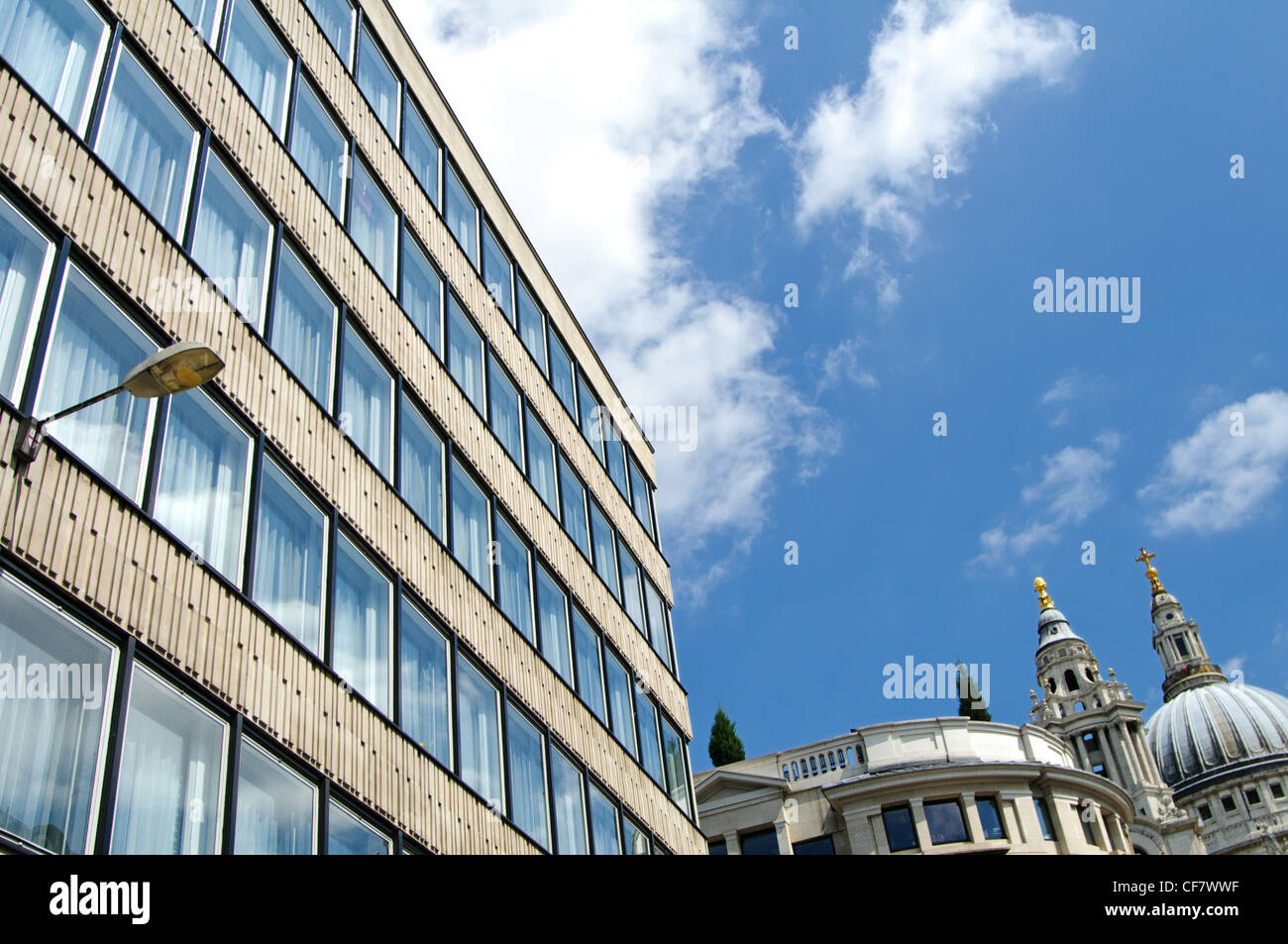 Architectural contrasts between St Paul's cathedral and modern office building, London. Stock Photo