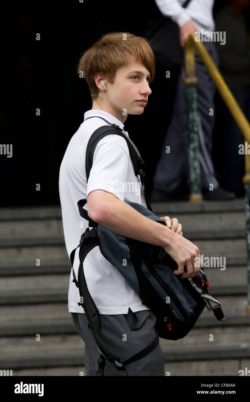 schoolboy with bag outside Flinders Street Station, Melbourne, Australia Stock Photo