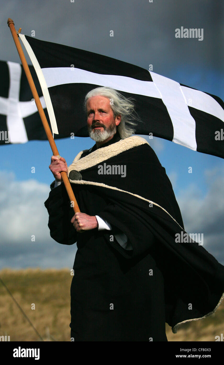 Actor plays St Piran for St Piran's Day, Perran Sands, Perranporth, Cornwall, UK Stock Photo