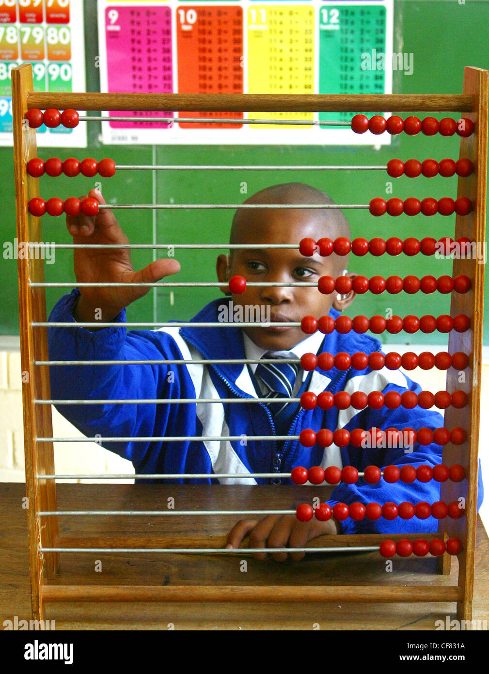 Young learner learning to count at Saint Vincent Primary School in Rosebank, Johannesburg, Gauteng Province, South Africa. Photo Stock Photo