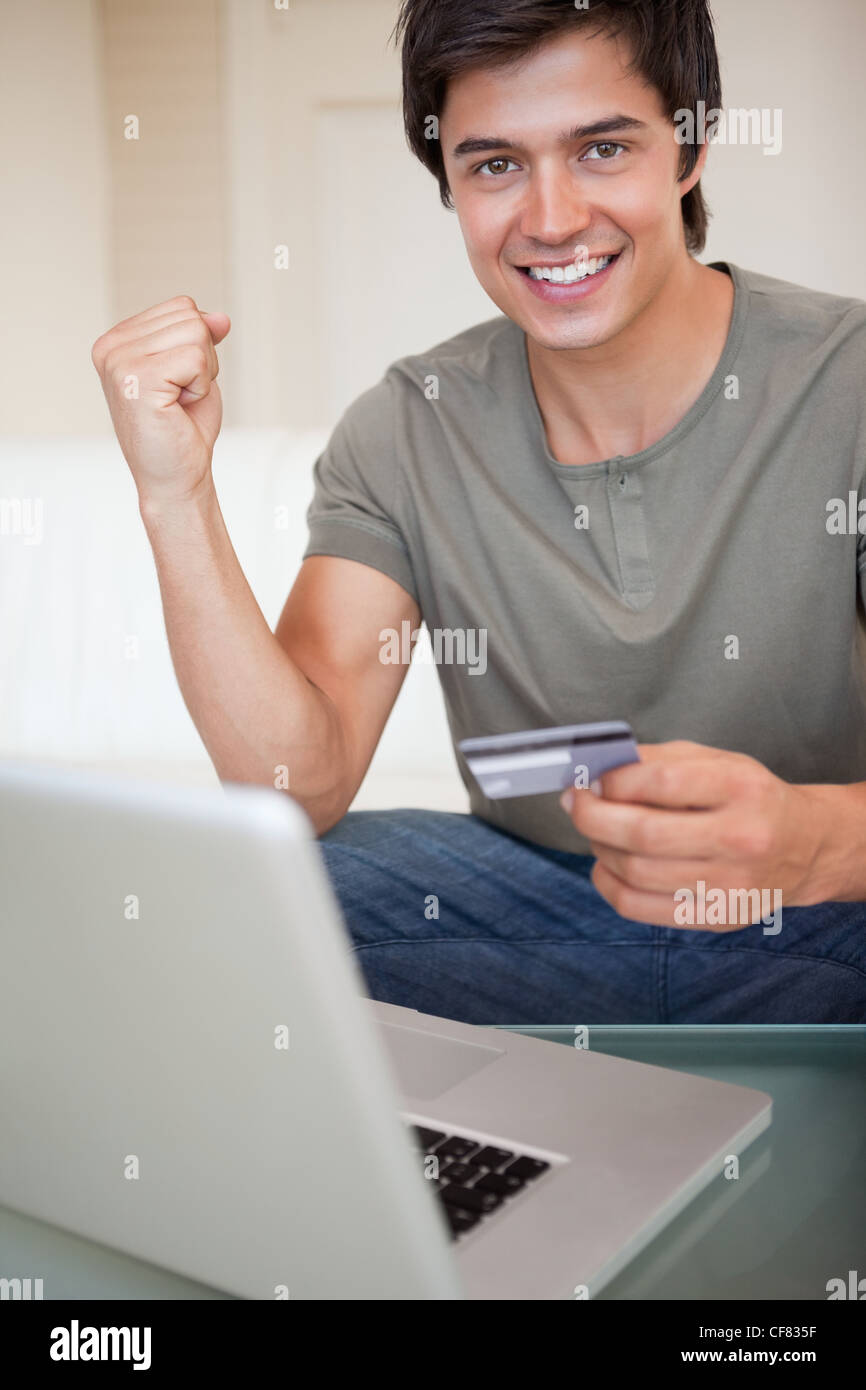 Portrait of a successful man shopping online Stock Photo - Alamy