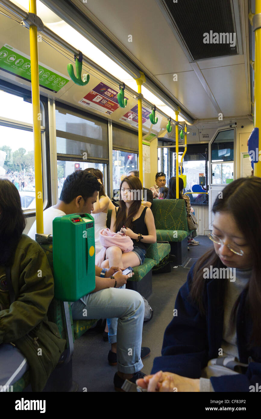 passengers on Melbourne tram, Australia Stock Photo