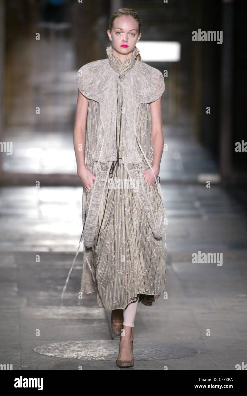 Haute Couture Anne Valerie Hash Spring Summer Paris Blonde female wearing a  taupe coloured crinkle lace blouse short sleeves Stock Photo - Alamy