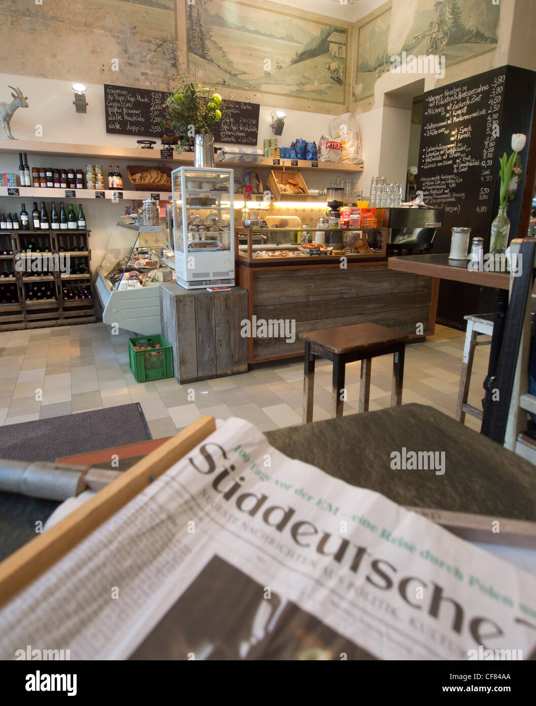 inside trendy bohemian cafe Meierei in Prenzlauer Berg Berlin Germany Stock Photo