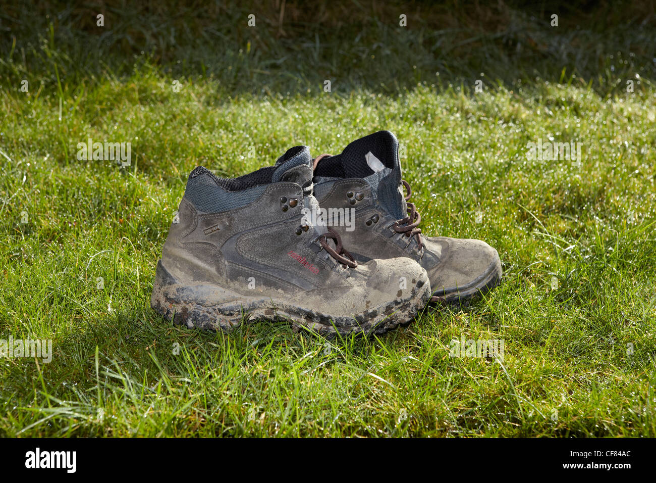 Muddy Hiking Boots Stock Photo - Alamy