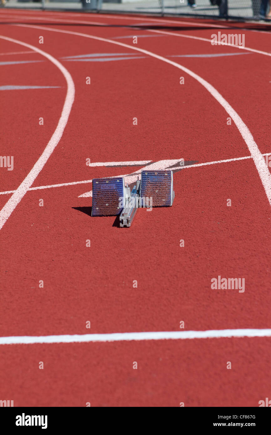 Starting blocks in a lane on a running track Stock Photo Alamy