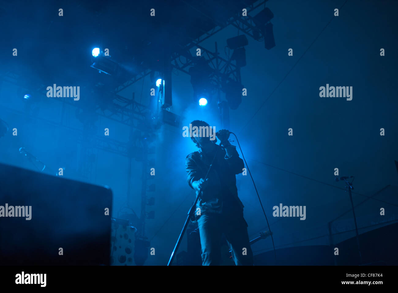 Singer for band Yeahsayer on stage with blue light, Sasquatch music festival Stock Photo
