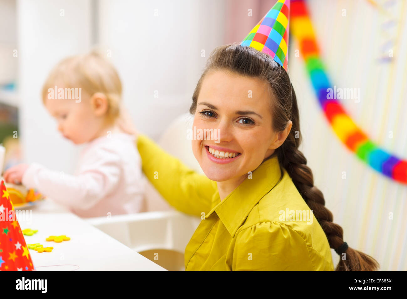 Portrait of happy mother celebrating baby first birthday Stock Photo Alamy