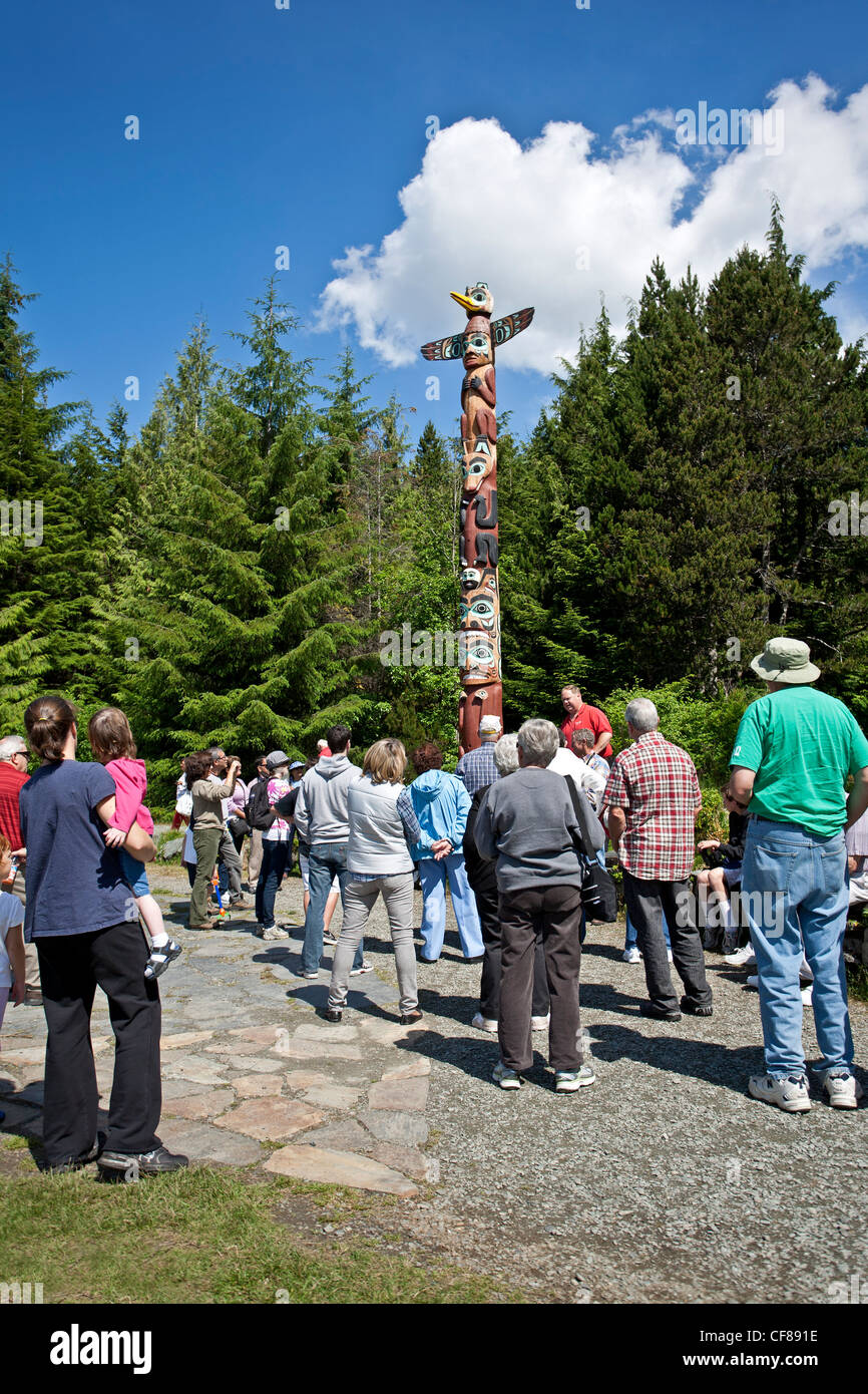 Guided tour at the Saxman Totem Park. Ketchikan. Alaska. USA Stock Photo