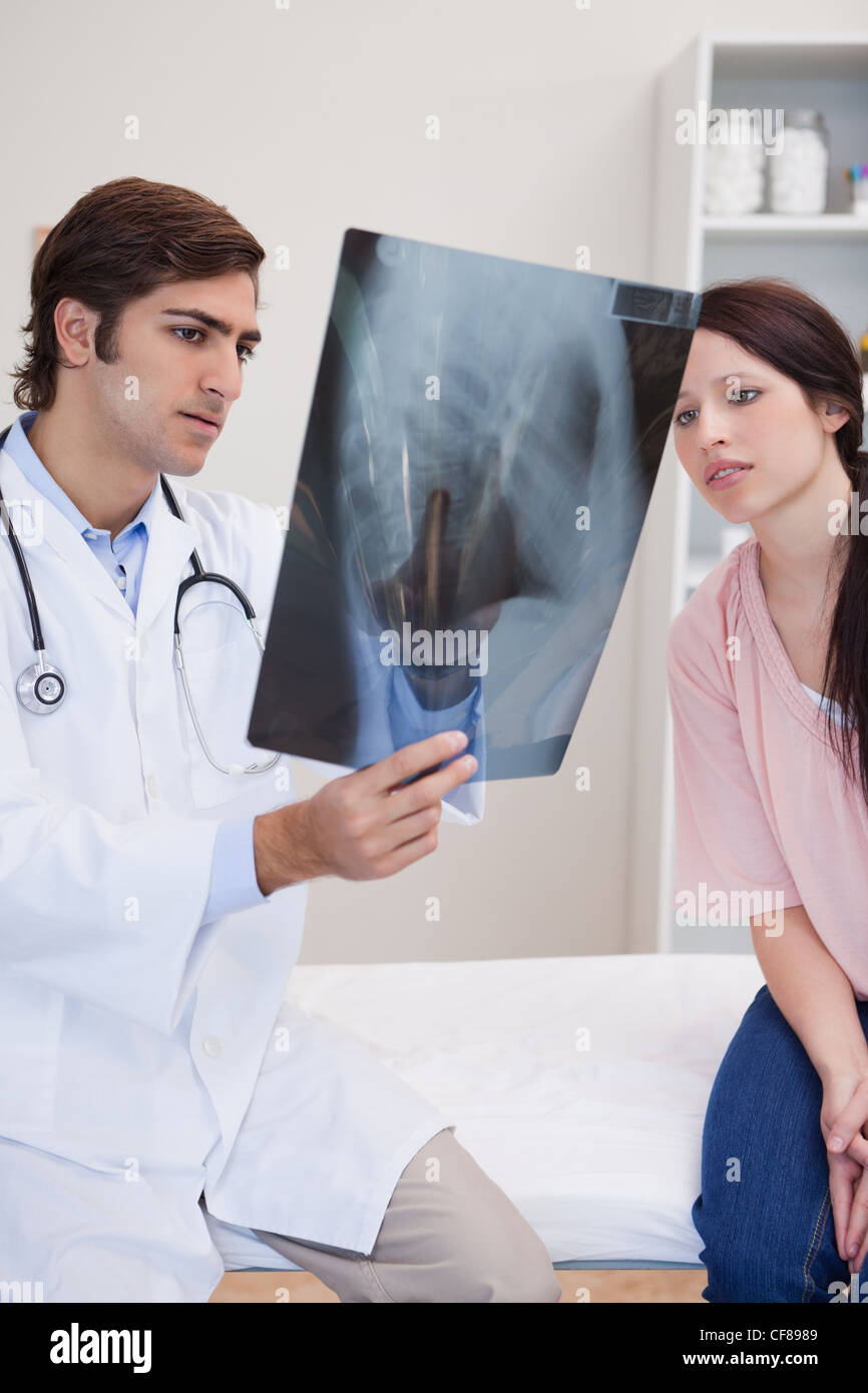 Doctor patient looking x ray hi-res stock photography and images - Alamy