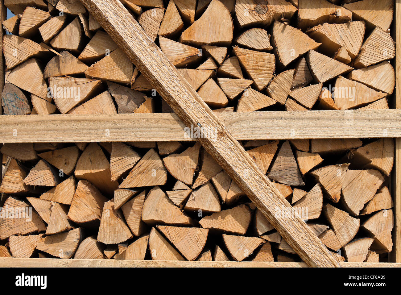 a large pile of wood for firewood Stock Photo