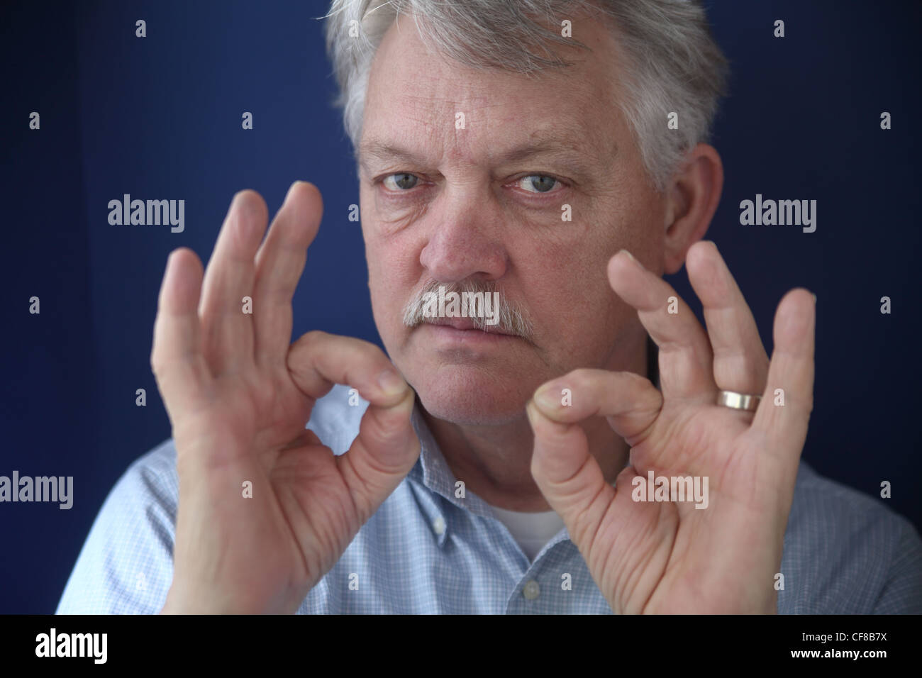 man gives positive hand gestures Stock Photo