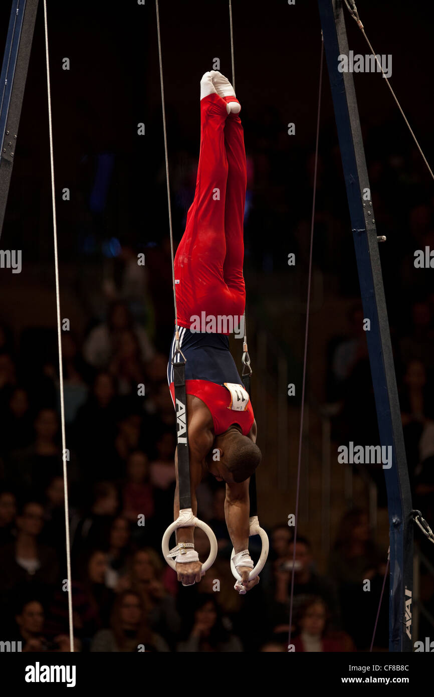 John Orozco (USA) competes in the still rings event at the 2012 American Cup Gymnastics Stock Photo