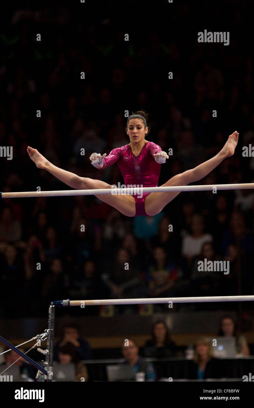 Alexander Raisman (USA) competes in the uneven bars event at the 2012 American Cup Gymnastics Stock Photo