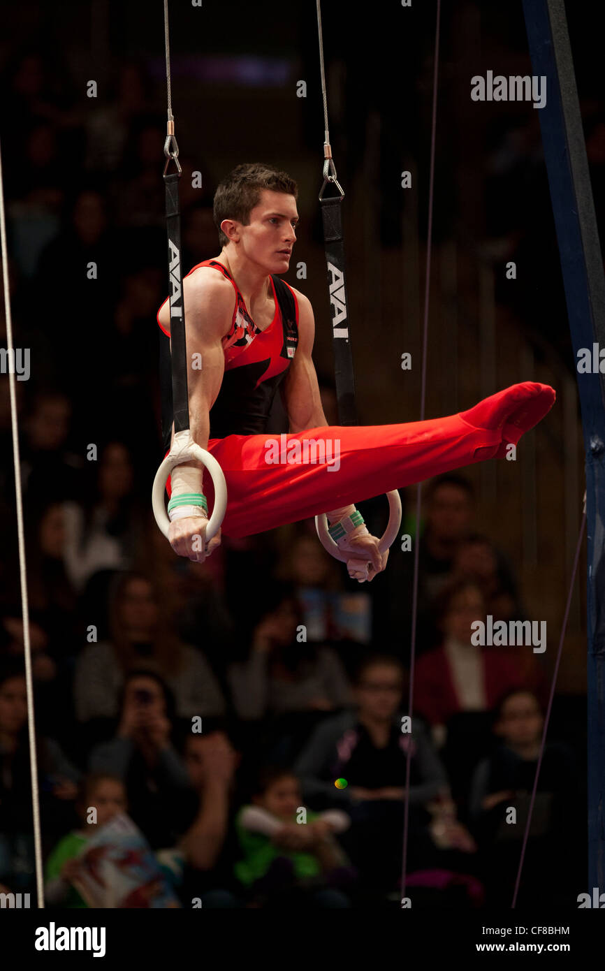 Jackson Payne (CAN) competes in the still rings event at the 2012 American Cup Gymnastics Stock Photo