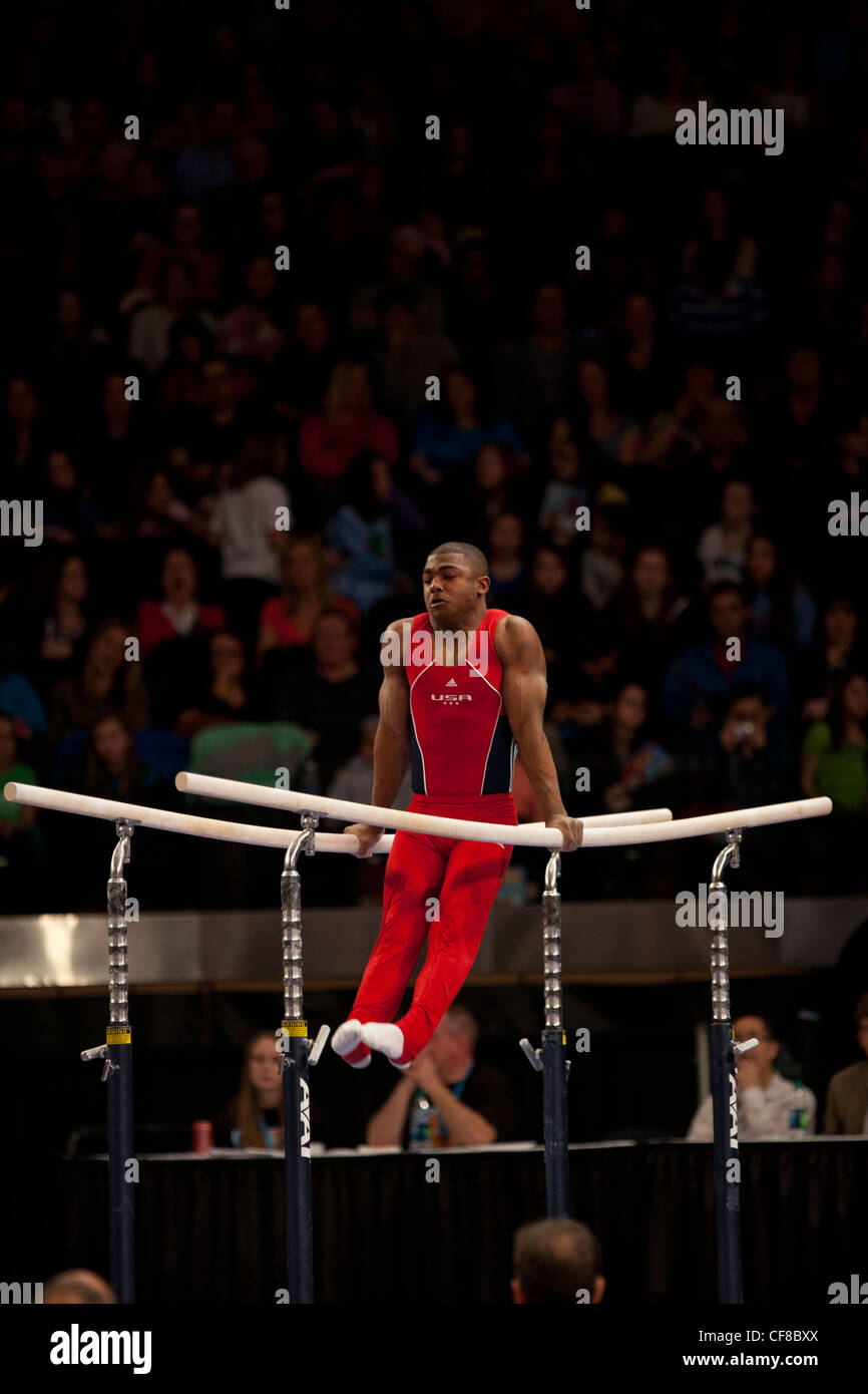 John Orozco (USA) competes in the parallel bars event at the 2012 American Cup Gymnastics Stock Photo