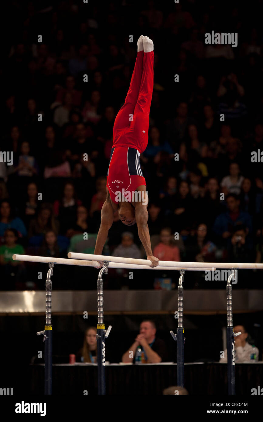 John Orozco (USA) competes in the parallel bars event at the 2012 American Cup Gymnastics Stock Photo