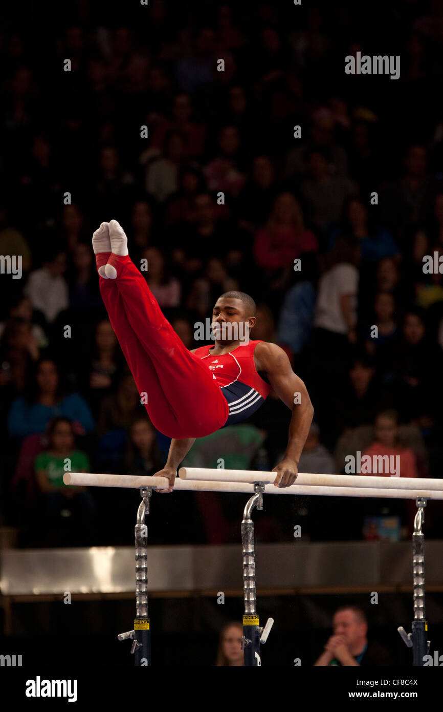 John Orozco (USA) competes in the parallel bars event at the 2012 American Cup Gymnastics Stock Photo